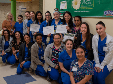 Nurses receiving Daisy Award