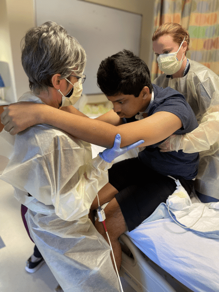 patient with occupational and physical therapists