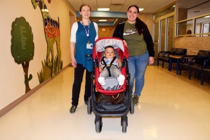 mom, therapist and baby in stroller