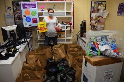 health home worker amongst supplies