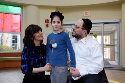 jewish child with parents