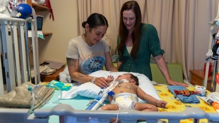 Mother with doctor and baby