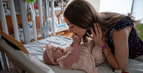 mom and baby in hospital room